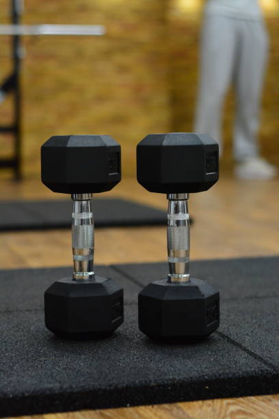 istock Dumbbells Weight Lifting Gym 869228904