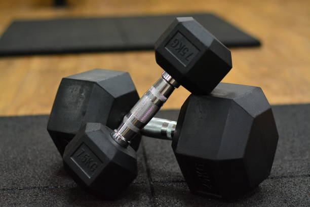 istock Dumbbells Weight Lifting Gym 869229344
