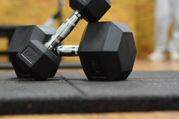 istock Dumbbells Weight Lifting Gym 869229500