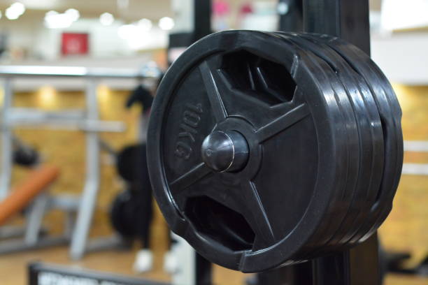 istock Weight Plates in a Gym 869230058