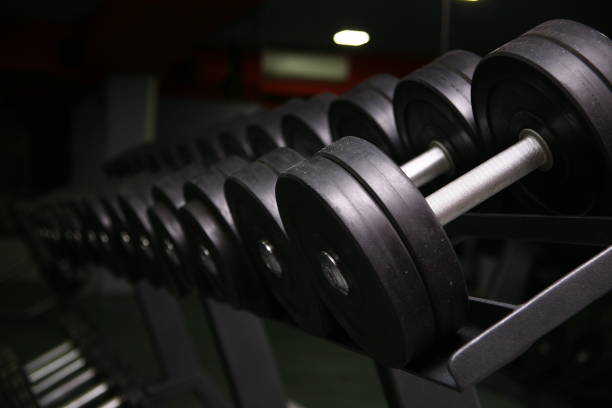 istock Dumbbells Row on a rack in gym 869230294