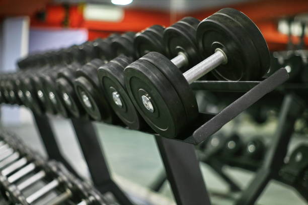 istock Dumbbells Row on a rack in gym 869230408