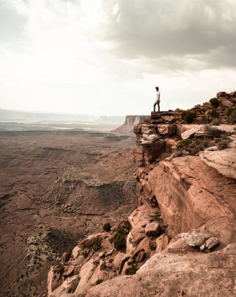 istock man on top of canyonlands 869231404