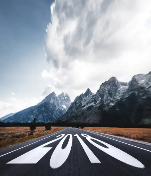 Photo of 2018 text on the road to the grand teton