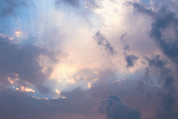 istock image of sunrise sky with clouds 869238624