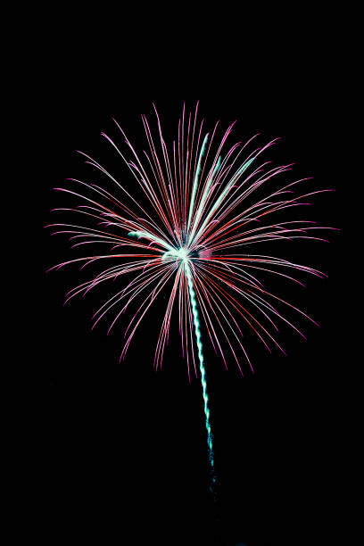 istock Beautiful Colorful New year fireworks over dark sky 869243420