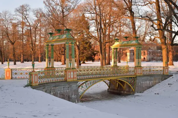 Painted the bridge with turrets through the Bypass channel in the Alexander Park in winter. Pushkin, Tsarskoye Selo, Saint Petersburg