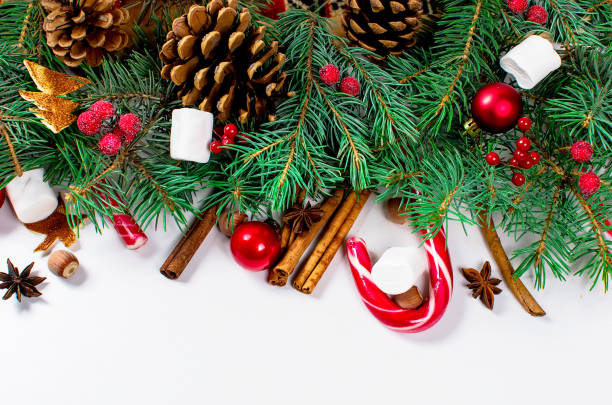 istock christmas background with fir, candy, ball 869246494