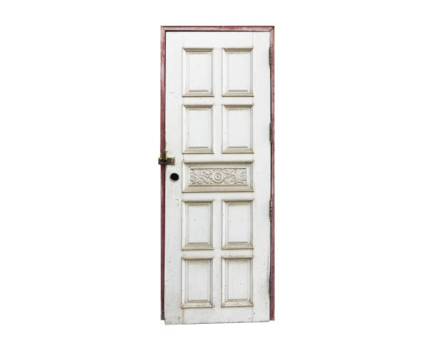 istock Isolated locked old white door with no knob on white 869250532