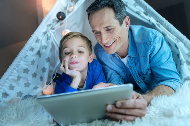 istock Enigmatical boy waiting for interesting story 869259590