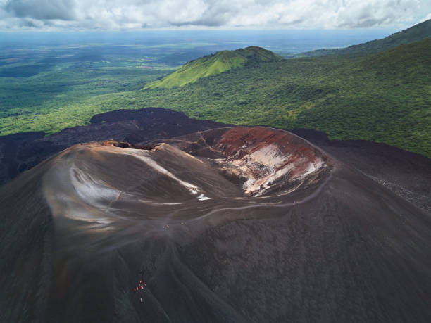 istock People on volcano sliding tour 869263384