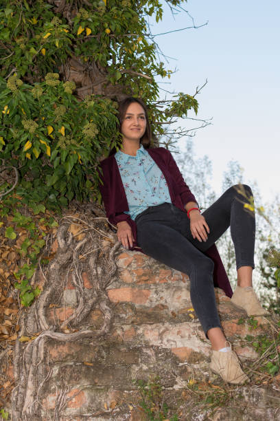 istock beautiful girl on ruin 869266526