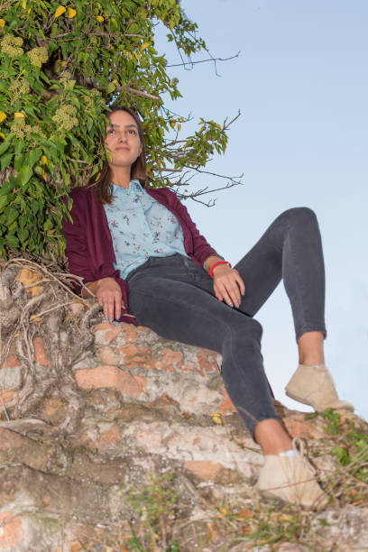 istock beautiful girl on ruin 869266530