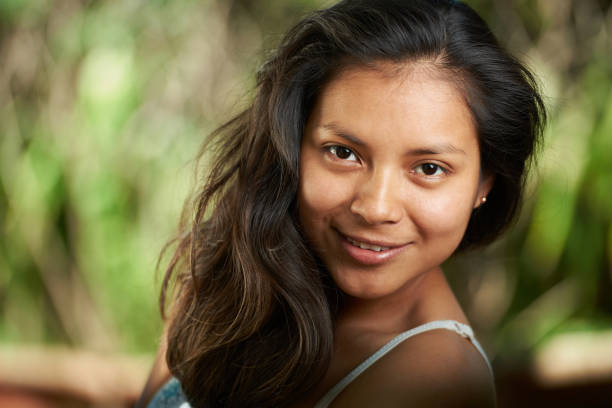 istock Smiling brunette woman 869269680