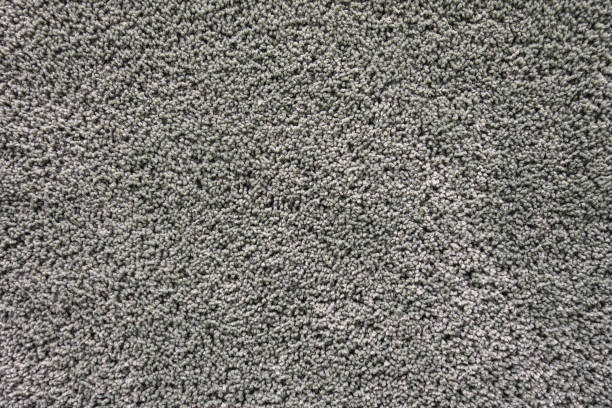 istock High resolution picture of gray soft carpet texture. 869270906