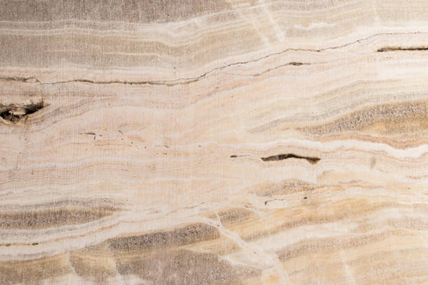 istock Lightened slices marble onyx. Horizontal image. Warm calm colors. Beautiful close up background, onyx marble texture. 869275564