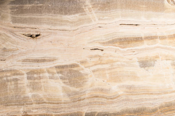 istock Lightened slices marble onyx. Horizontal image. Warm calm colors. Beautiful close up background, onyx marble texture. 869275810