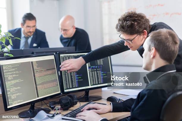 Startup Business Problem Solving Software Developers Working On Desktop Computer Stock Photo - Download Image Now