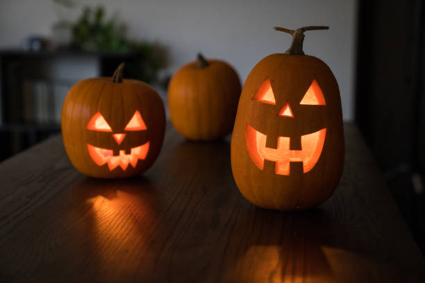 istock A pumpkin carved into a Jack o' lantern for Halloween 869276066