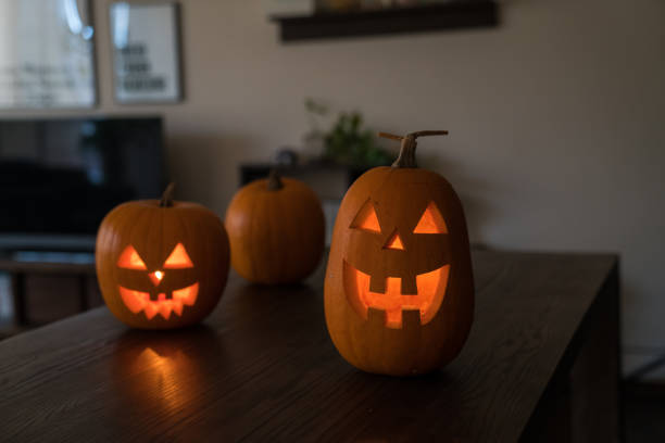 istock A pumpkin carved into a Jack o' lantern for Halloween 869276076