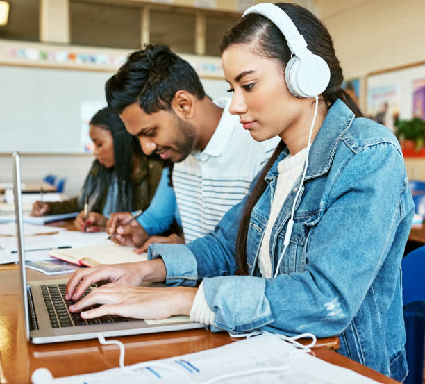 istock Listening to a little music in class 869283328