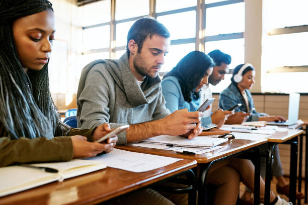 istock Paying more attention to their phones than to their studies 869283384