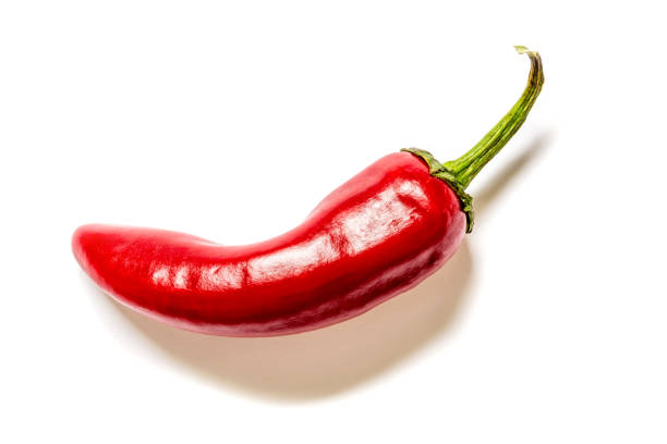 istock Chili pepper closeup isolated on white background 869283440
