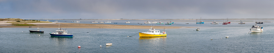 Panoramic View of Fishing Boats on Calm Waters