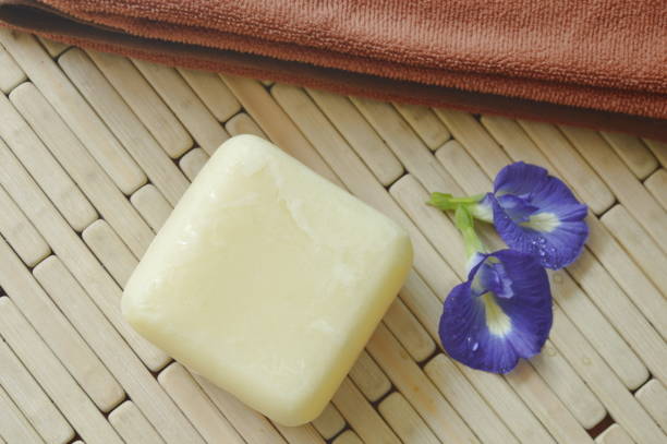 istock soap and towel with blue pea violet flower 869291802