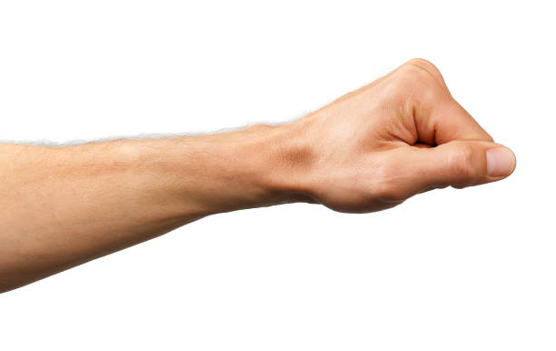 istock human hand  made into a fist isolated 869295098