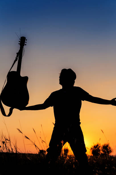 istock Silhouette of a guitarist 869297932