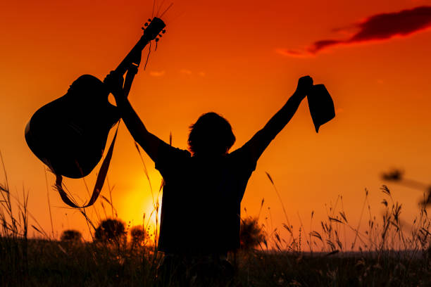 istock Silhouette of a guitarist 869297962