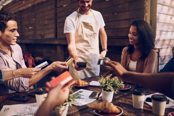 istock Let the waiter decide who'll be paying 869301528