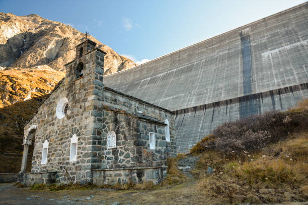 Small chapel near Grand Dixence dam, the tallest gravity dam in the world Small chapel near Grand Dixence dam, the tallest gravity dam in the world grand dixence stock pictures, royalty-free photos & images