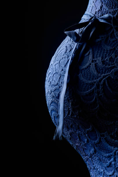 Pregnant young woman in profile.