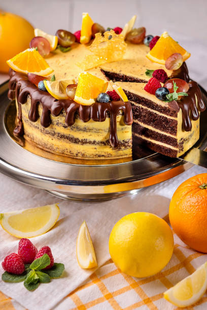 istock Orange cake with chocolate and orange slices 869302468