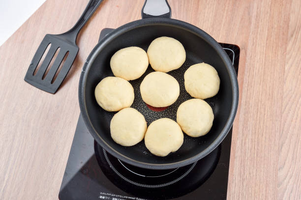 istock the process of chef cooking pan-fried bun 869314358