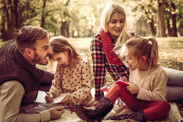 istock Family class in nature. 869314624