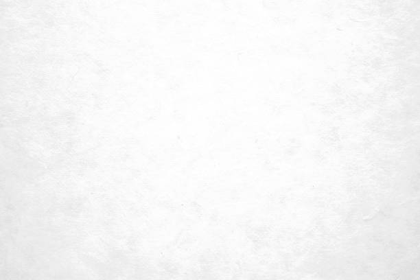 istock Blank white paper texture background, detail close up 869317990
