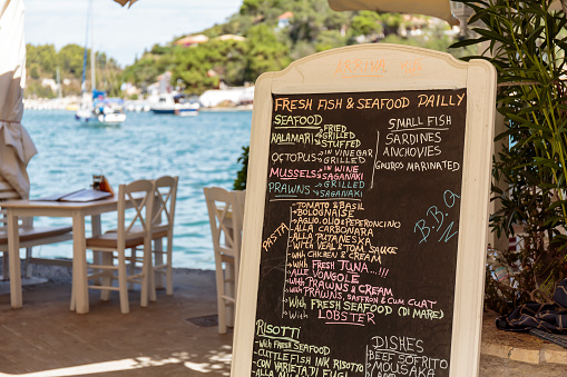 Lakka, Greece - September 05, 2017: Restaurant menu in Lakka on Paxos, Ionians Islands, Greece