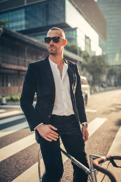 istock Attractive man with bike 869320000