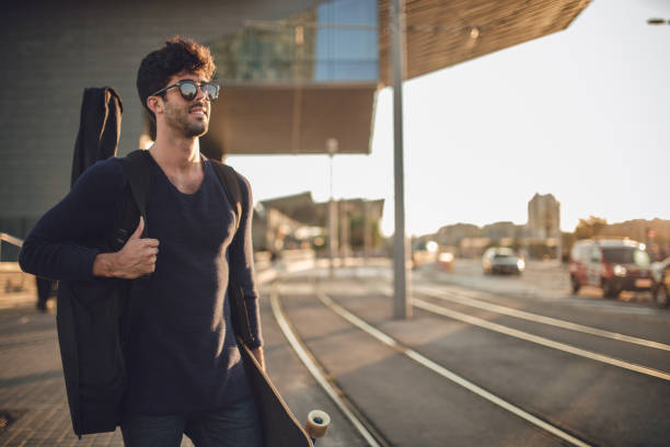 istock Hipster man on the street 869321518
