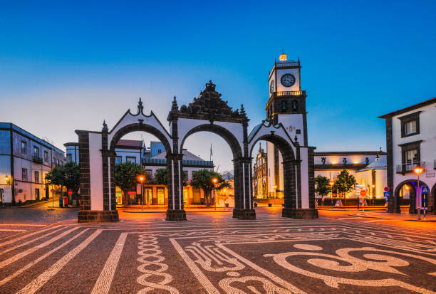 City Gates in Ponta Delgada at dusk (Azores) City Gates in Ponta Delgada at dusk (Azores) city gate stock pictures, royalty-free photos & images