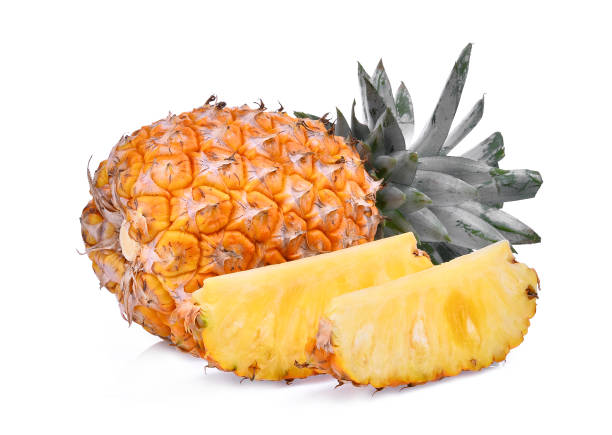 istock ripe whole and slice pineapple isolated on white background 869329430