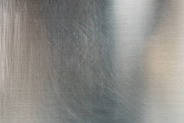 istock Polished steel texture, Stainless steel background 869338844