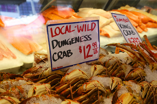 Local and Wild Dungeness crabs for sale at Pike Place Market in Seattle, Washington