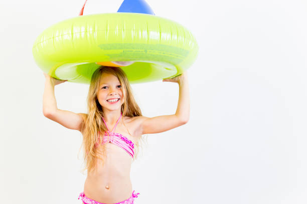 istock Girl on a beach 869349474