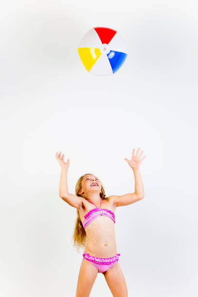 istock Girl on a beach 869351802