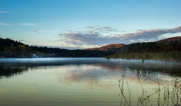 istock Lakeside morning at sunset 869351936