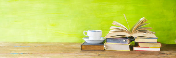 istock vintage books with coffee cup, 869352402